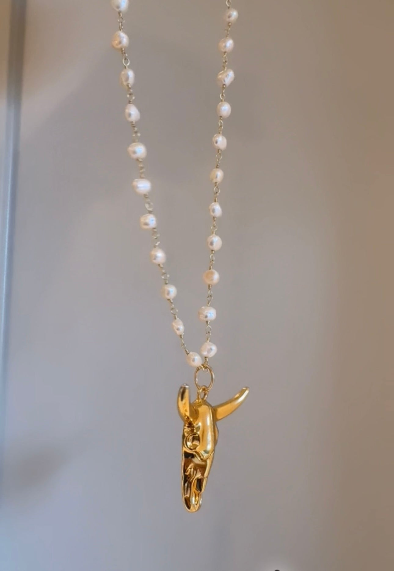Bull pendant on pearl chain or paperclip chain