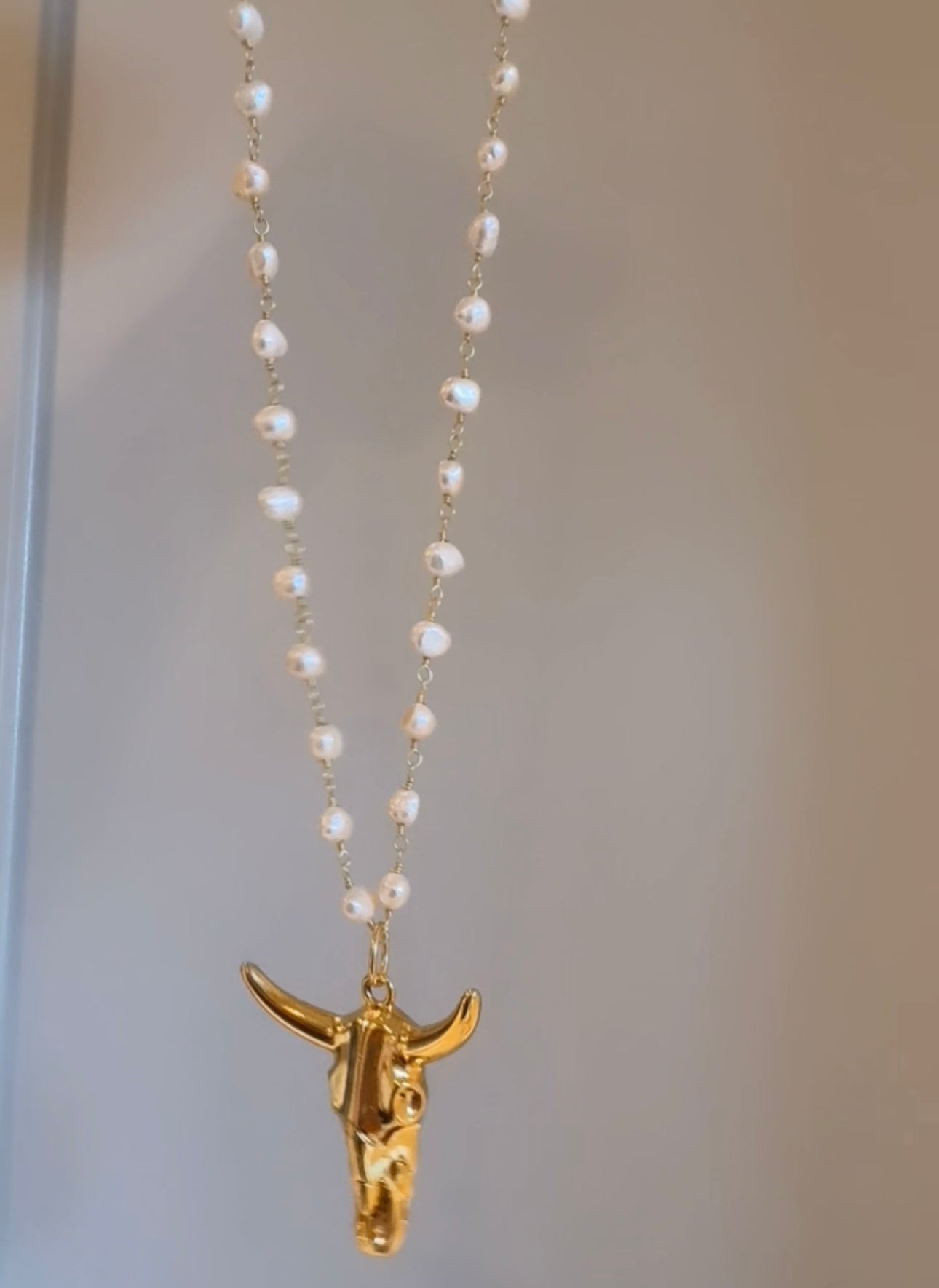 Bull pendant on pearl chain or paperclip chain